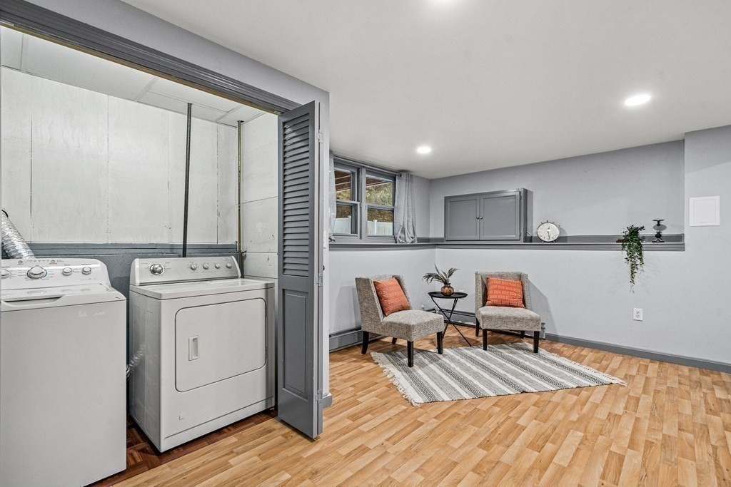 28 Sycamore Road Methuen, MA 01844 - Photo 26 of 35 a living room with furniture and wooden floor