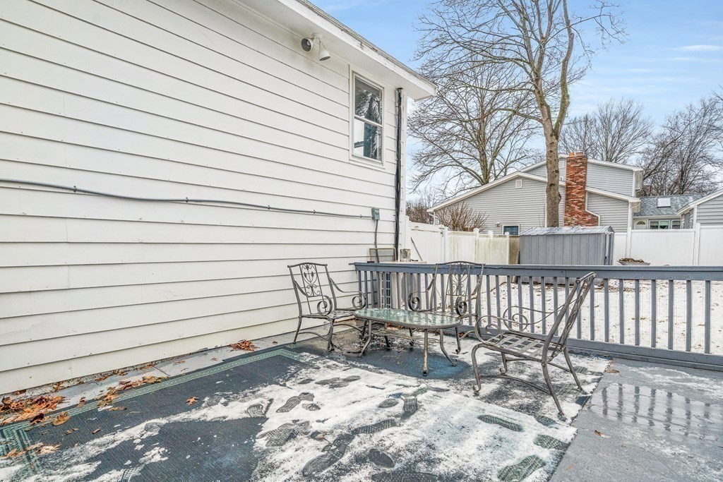 28 Sycamore Road Methuen, MA 01844 - Photo 30 of 35 a view of a chair with wooden fence