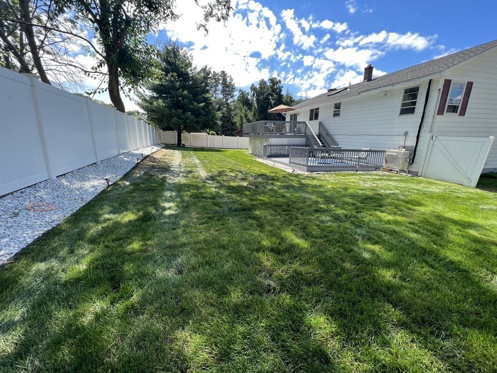 28 Sycamore Road Methuen, MA 01844 - Photo 34 of 35 a view of a backyard with a tree
