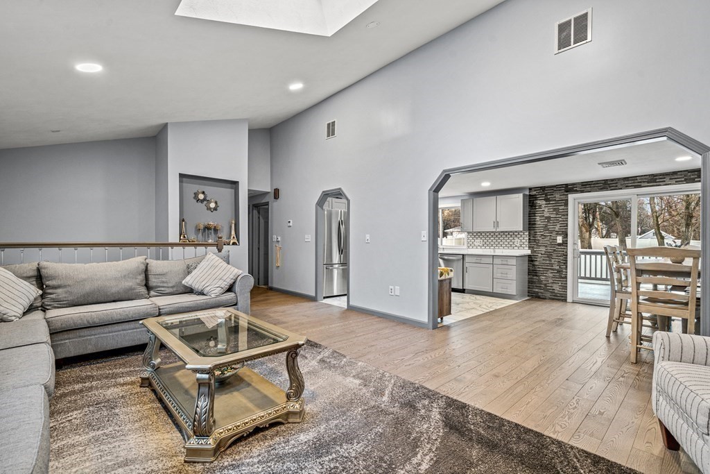 28 Sycamore Road Methuen, MA 01844 - Photo 6 of 35 a living room with furniture and view of kitchen