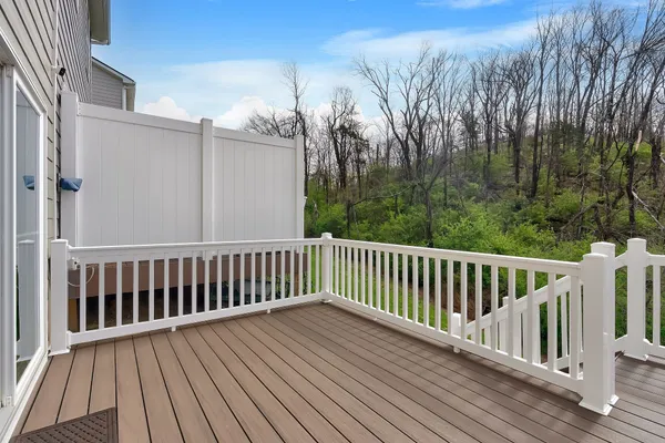 a view of deck with wooden floor and fence