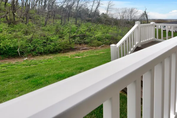 a view of a garden from a balcony