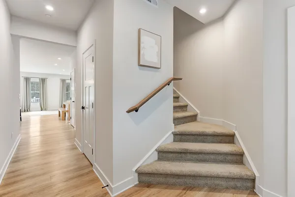 a view of staircase with white walls and white walls