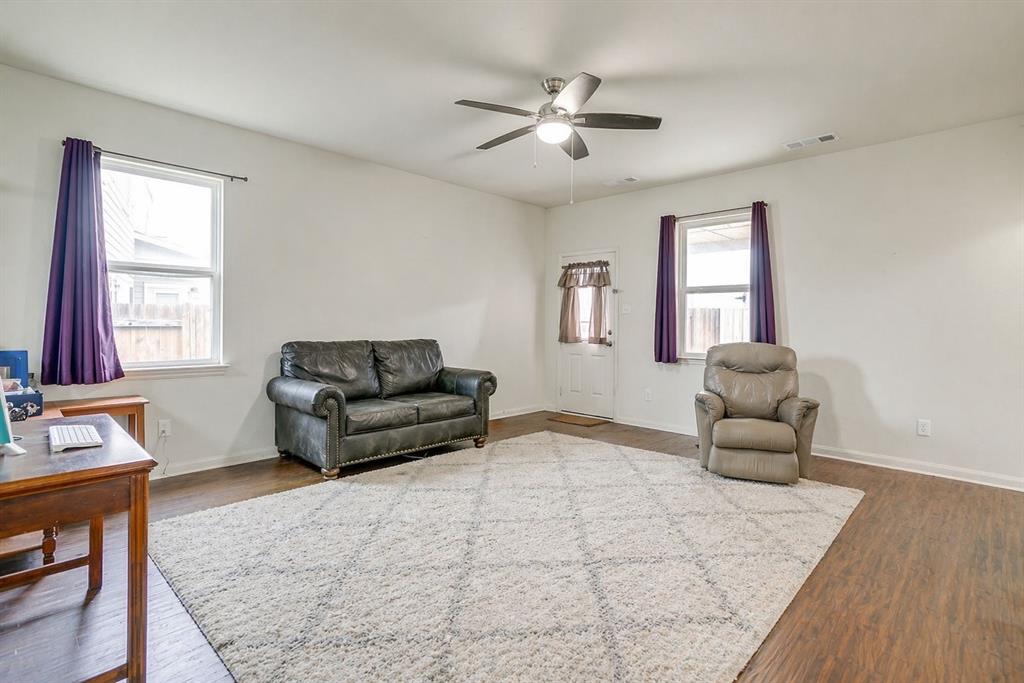 136 Kennedy Drive Venus, TX 76084 - Photo 7 of 27 a living room with furniture and a window