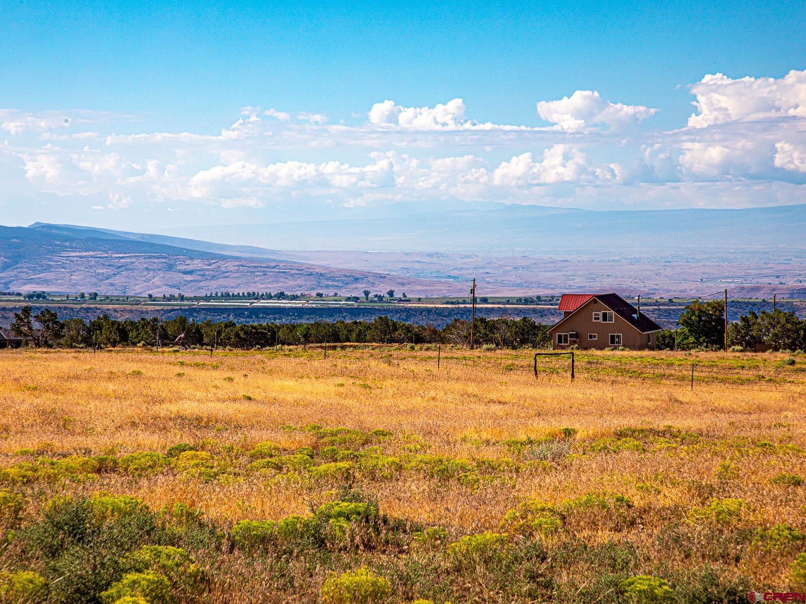 Lot 2 Cedar Mesa Road Cedaredge, CO 81413 - Photo 14 of 18 a view of an ocean and a mountain