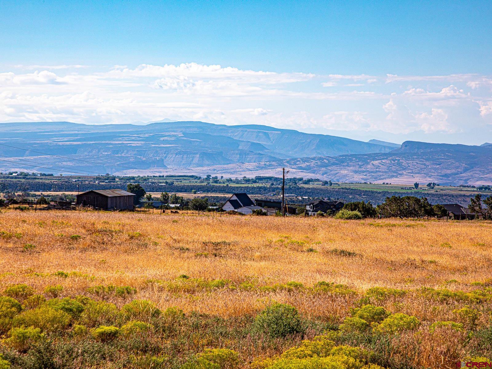 Lot 2 Cedar Mesa Road Cedaredge, CO 81413 - Photo 17 of 18 a view of an ocean and a mountain