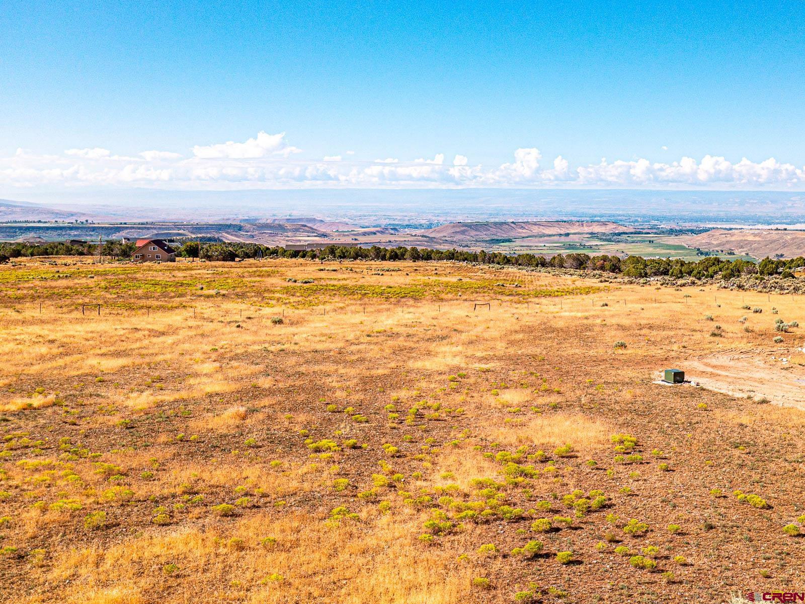 Lot 2 Cedar Mesa Road Cedaredge, CO 81413 - Photo 9 of 18 a view of an ocean and in the background