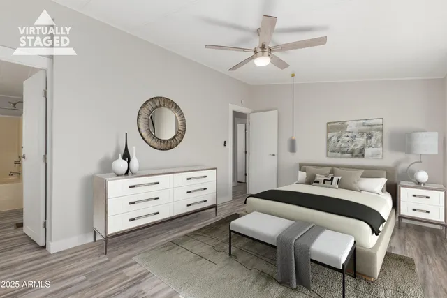 a bedroom with a bed and a dresser