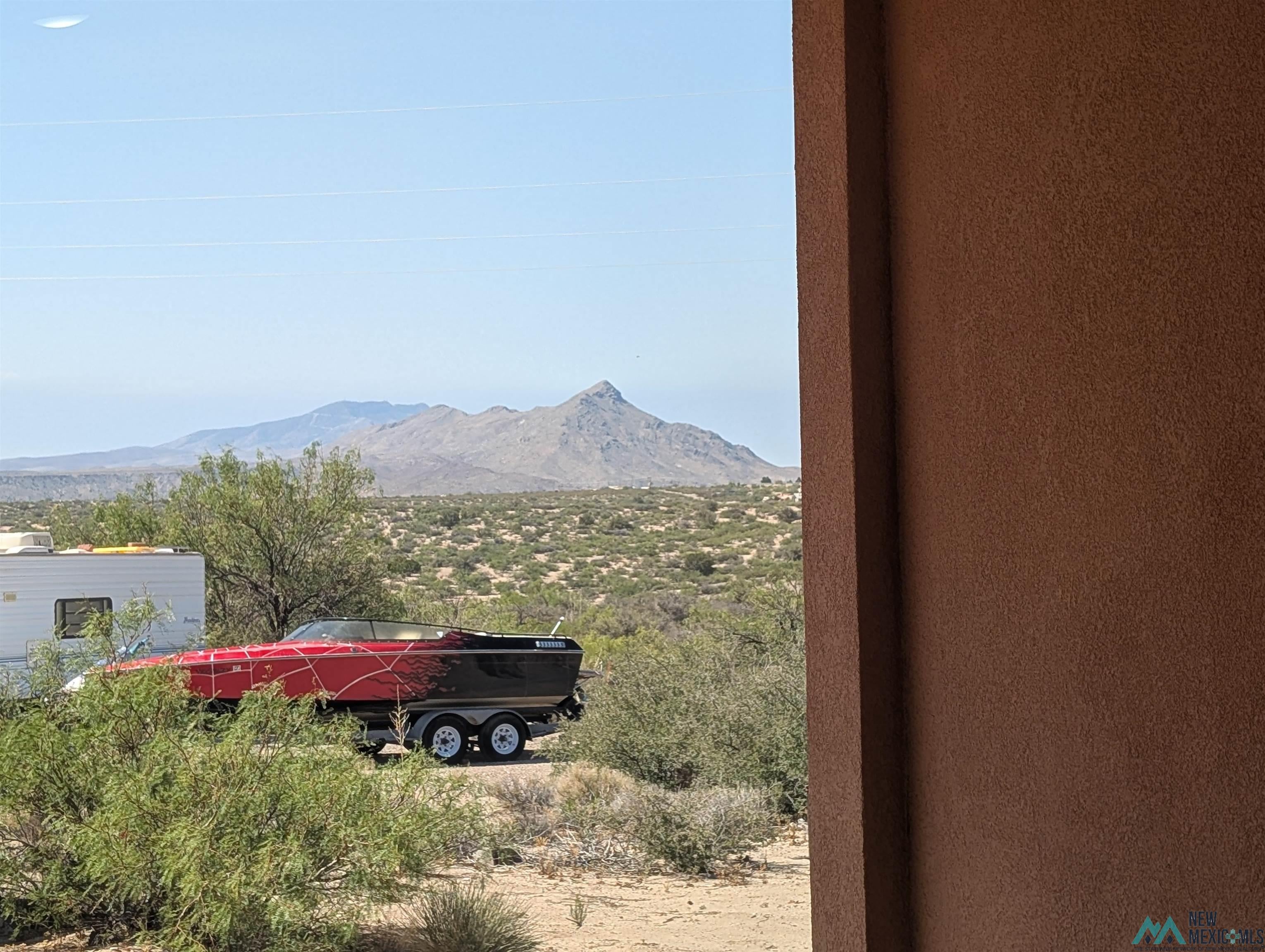 506 Bass Road Elephant Butte, NM 87935 - Photo 21 of 23 Desert landscape with distant mountains