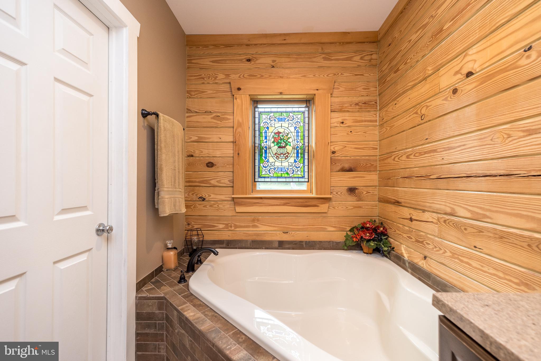 7223 Ferry Road New Hope, PA 18938 - Photo 34 of 87 a bathroom with a tub and a shower