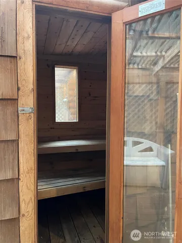 a bathroom with a bathtub and shower