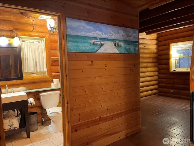 a stove top oven sitting inside of a kitchen