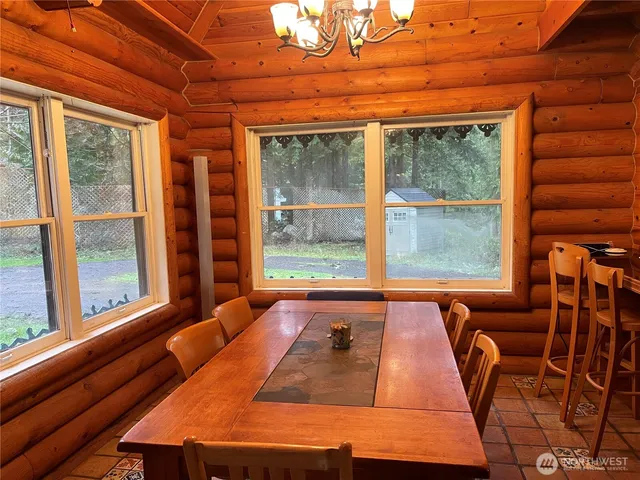 a view of living room with washer and dryer