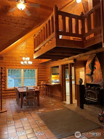 a view of a chairs and a table in the patio