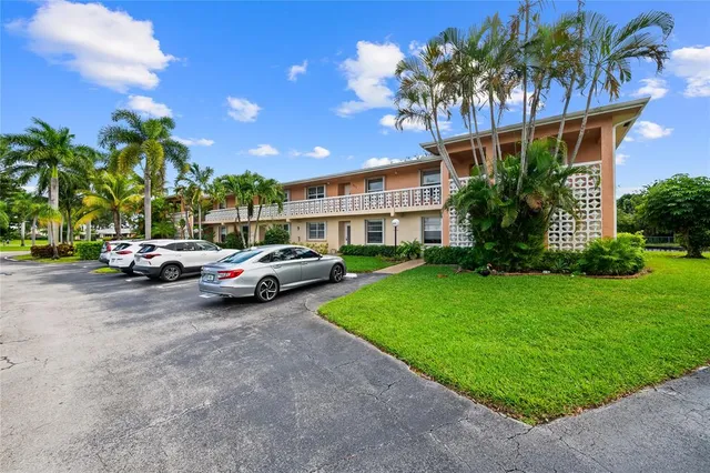 a view of yard with car parked