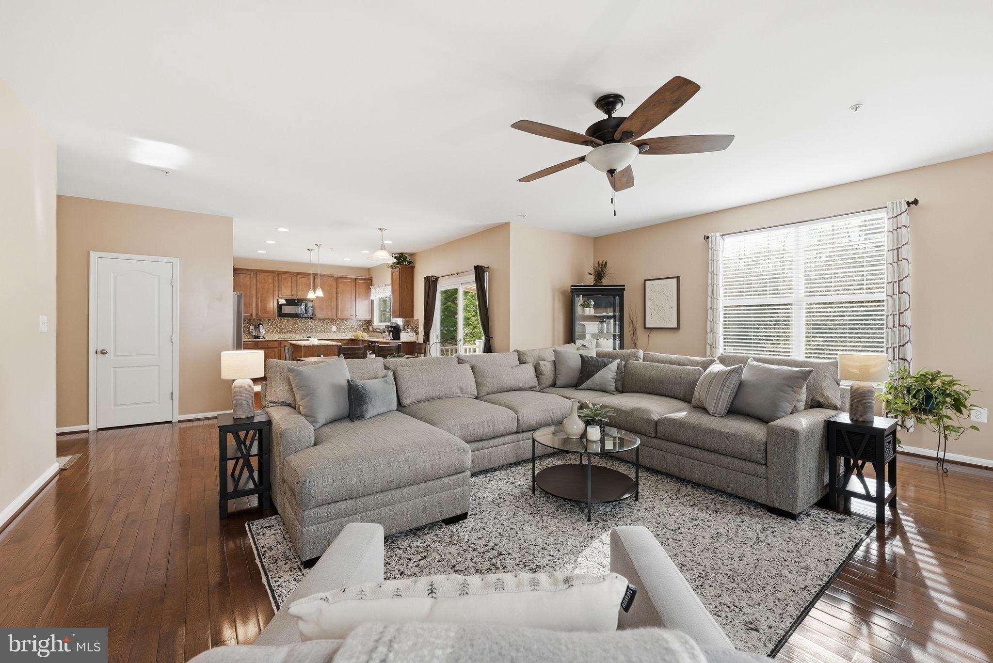 6900 Lenape Court Brandywine, MD 20613 - Photo 14 of 43 a living room with furniture ceiling fan and a window
