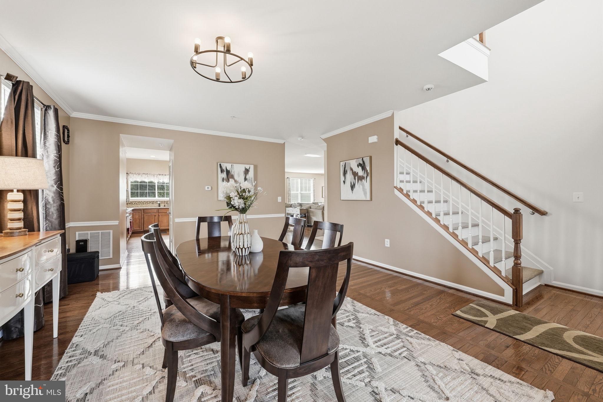 6900 Lenape Court Brandywine, MD 20613 - Photo 15 of 43 a view of a dining room with furniture