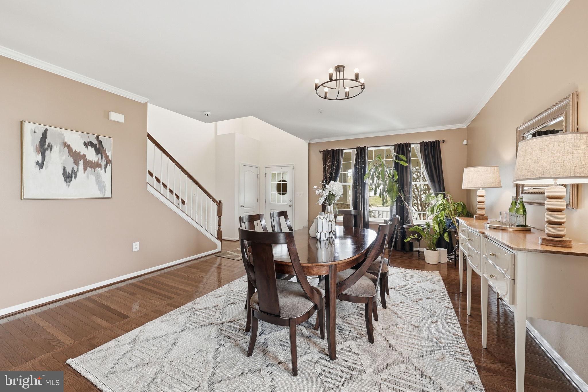 6900 Lenape Court Brandywine, MD 20613 - Photo 2 of 43 a view of a dining room with furniture window and wooden floor