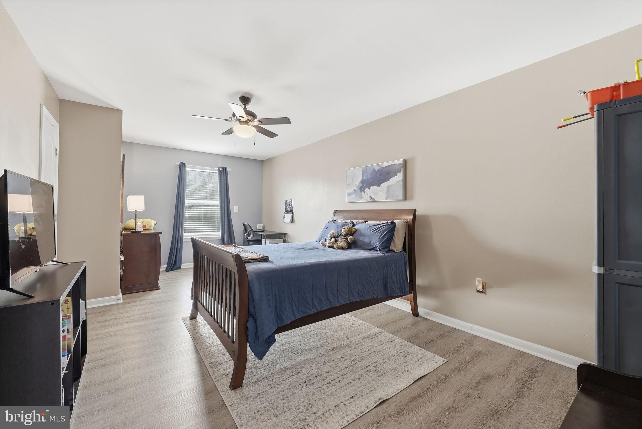 6900 Lenape Court Brandywine, MD 20613 - Photo 23 of 43 a living room with furniture and a ceiling fan