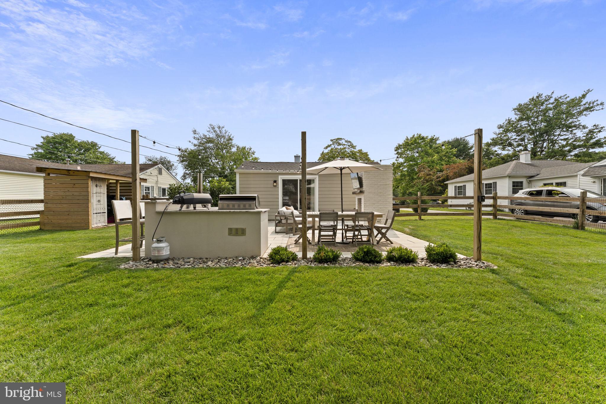 113 Manor Road Paoli, PA 19301 - Photo 39 of 44 a view of a house with backyard and sitting area