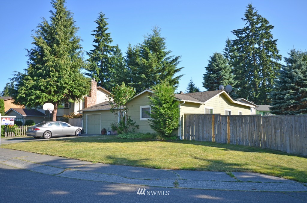 2608 165th Place Southeast Bothell, WA 98012 - Photo 1 of 13 a view of a house with backyard and trees