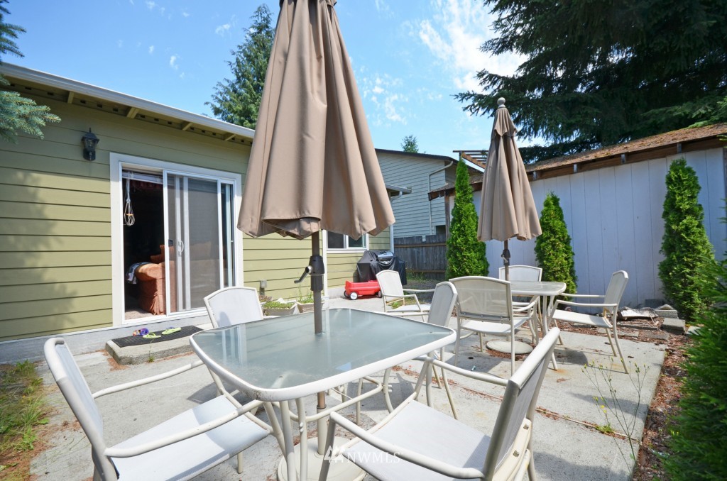 2608 165th Place Southeast Bothell, WA 98012 - Photo 12 of 13 a view of table and chairs in patio