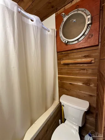 a bathroom with a toilet and a sink