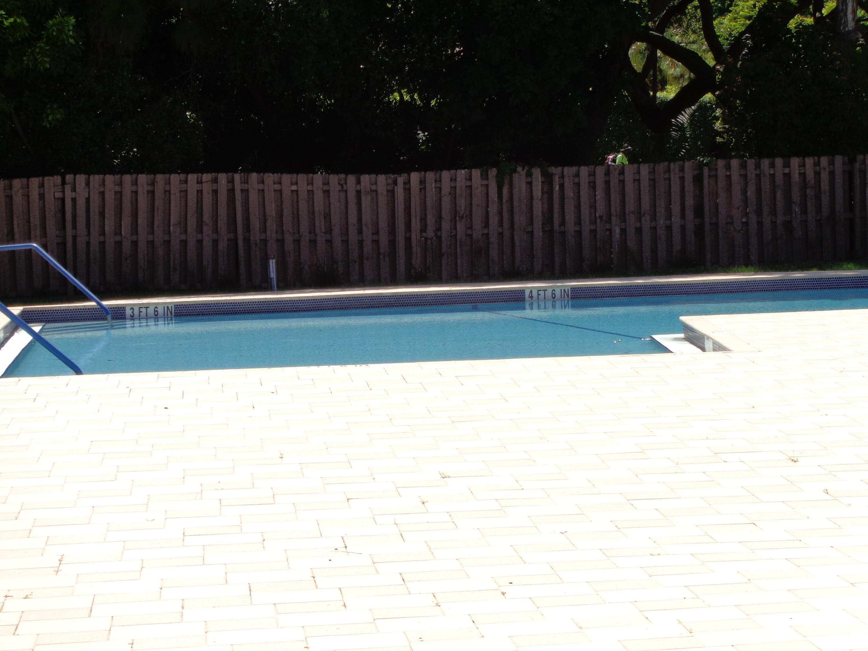 301 Olivewood Place, Unit O227 Boca Raton, FL 33431 - Photo 18 of 20 a view of a backyard