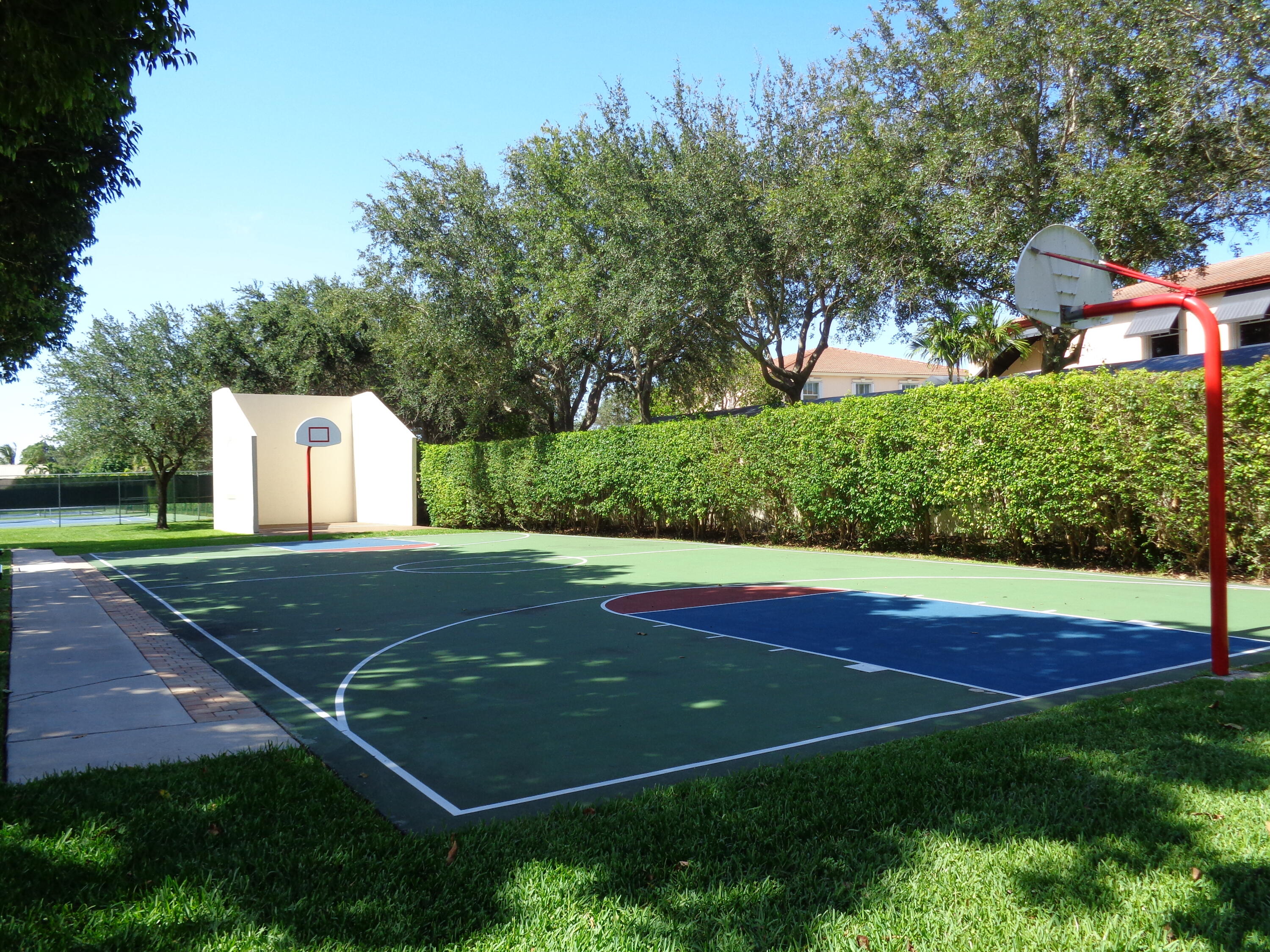 301 Olivewood Place, Unit O227 Boca Raton, FL 33431 - Photo 19 of 20 a view of a tennis court