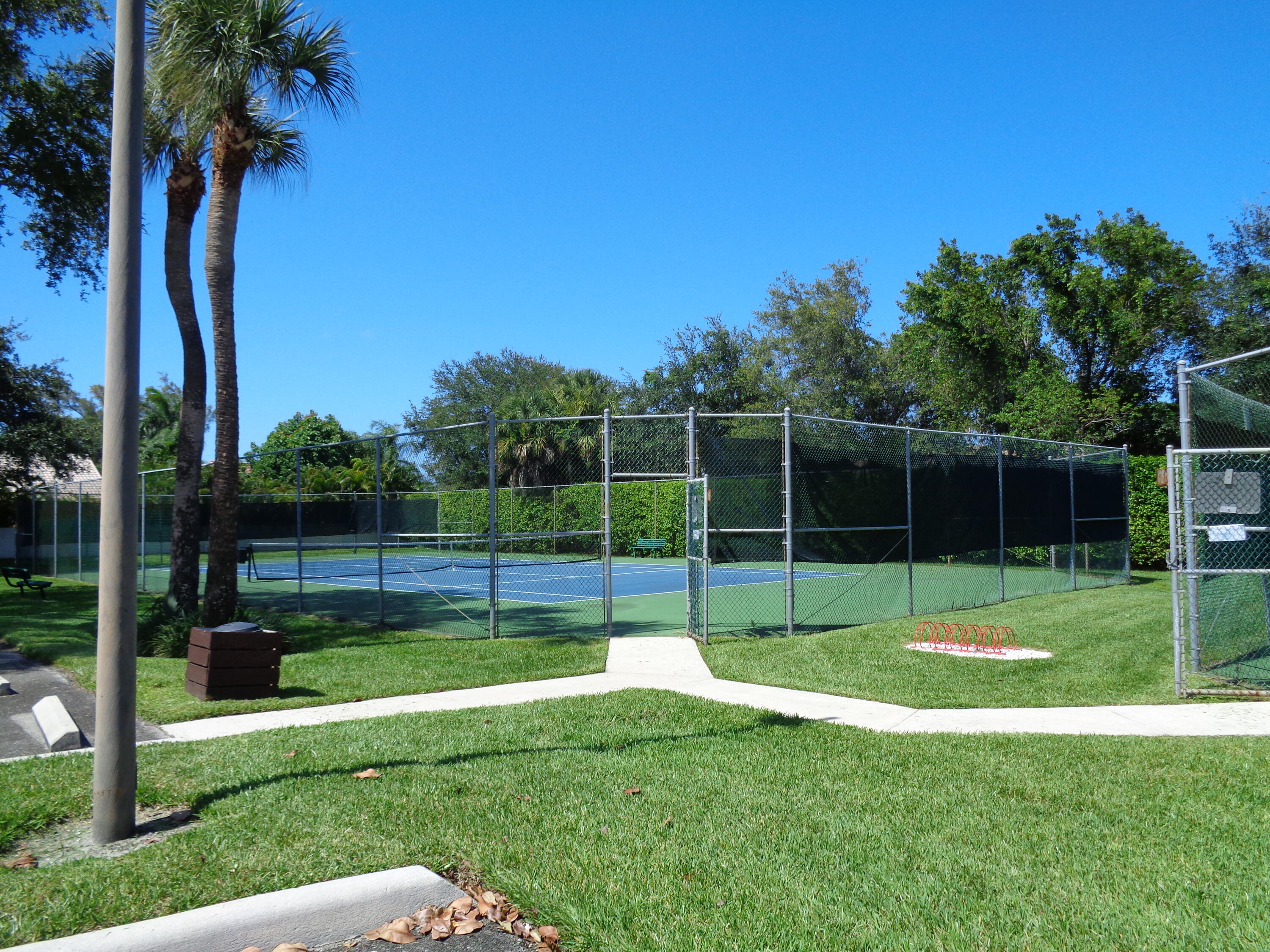 301 Olivewood Place, Unit O227 Boca Raton, FL 33431 - Photo 20 of 20 a view of a park with a big yard