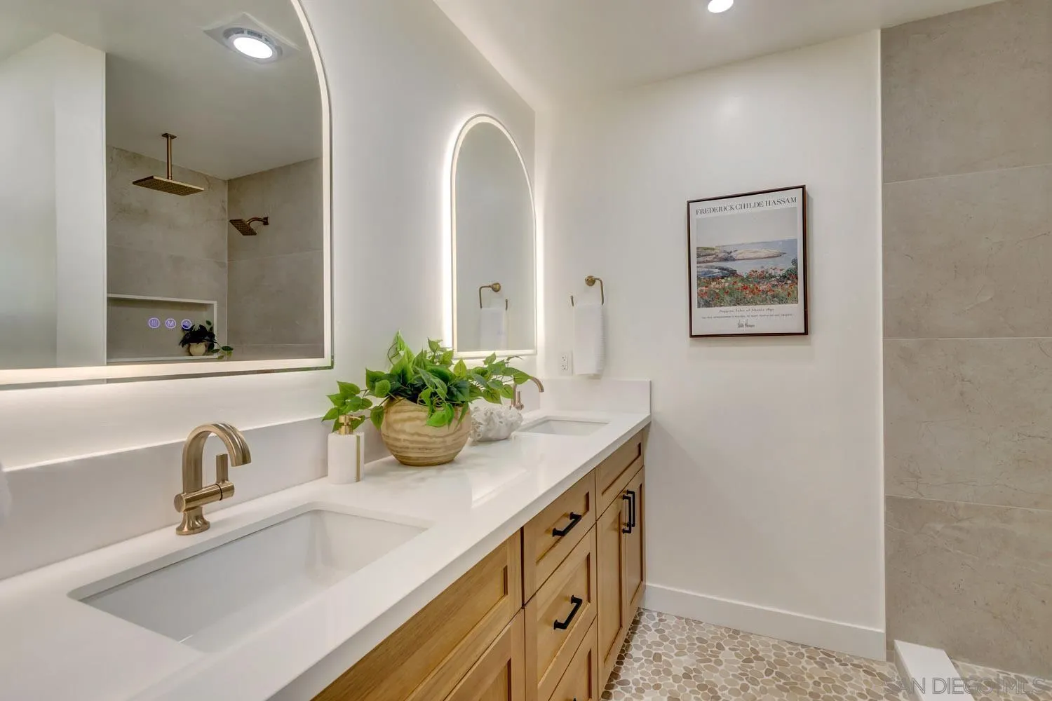 5701 Madra Avenue San Diego, CA 92120 - Photo 12 of 15 a bathroom with a sink a vanity and a mirror