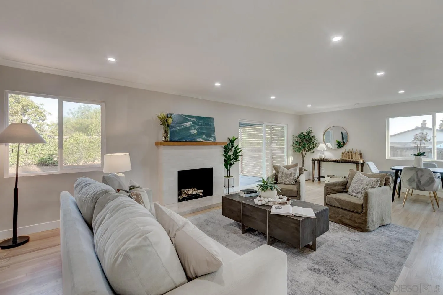 5701 Madra Avenue San Diego, CA 92120 - Photo 4 of 15 a living room with furniture fireplace and window