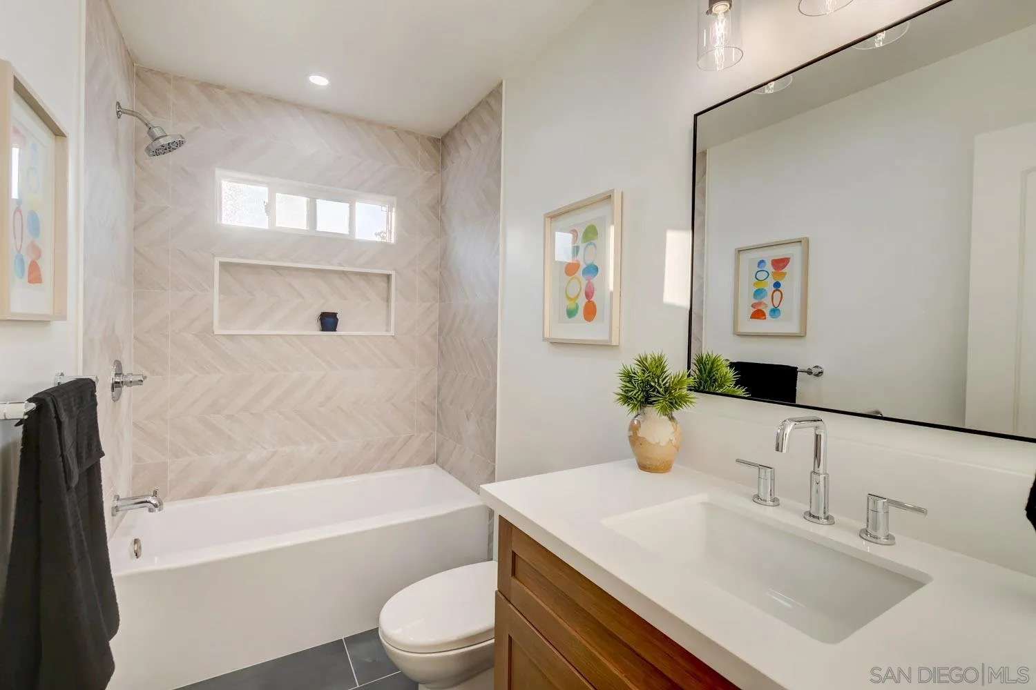 5701 Madra Avenue San Diego, CA 92120 - Photo 7 of 15 a bathroom with a sink a toilet and shower