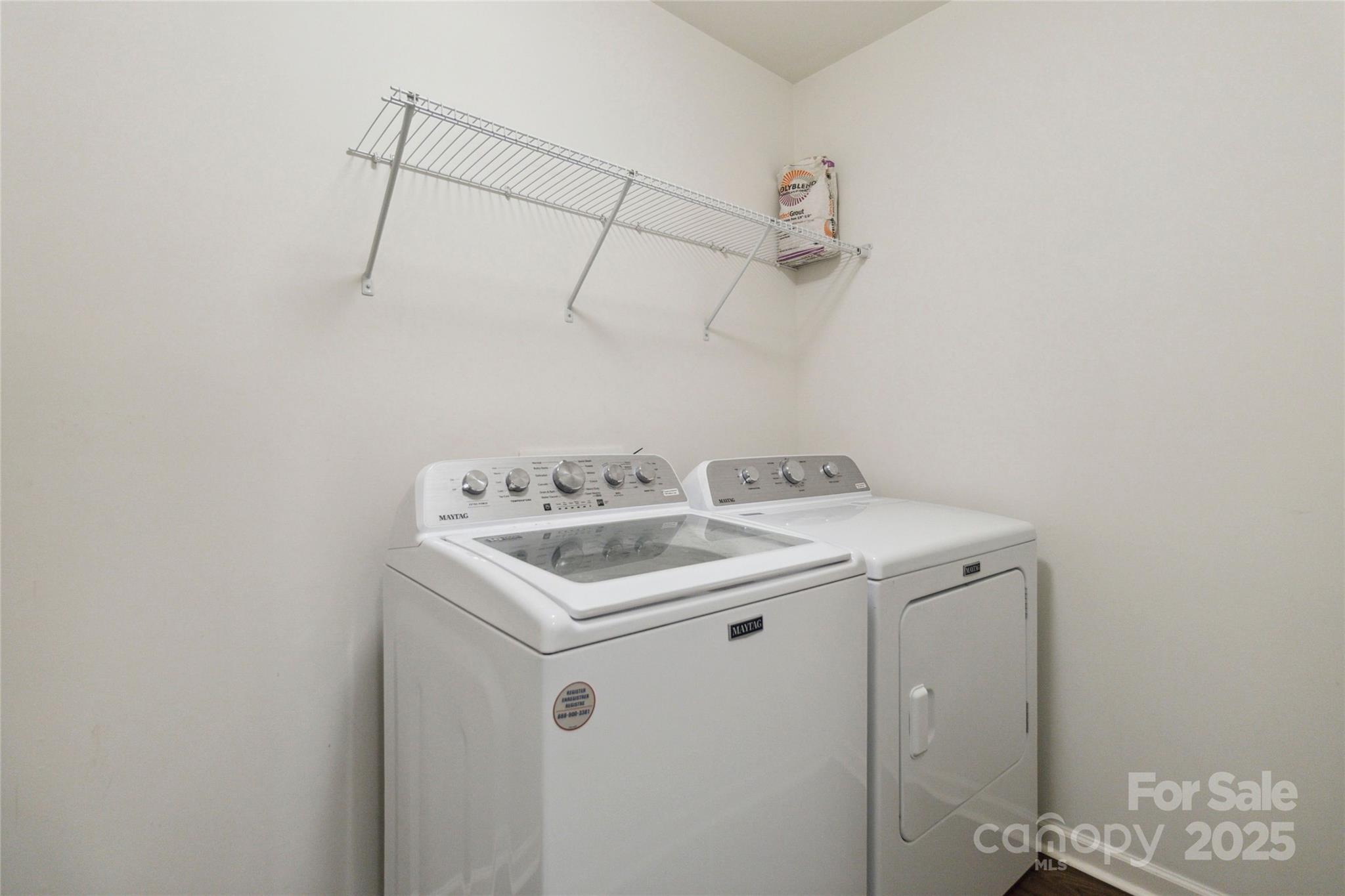 14027 Clayborn Street Midland, NC 28107 - Photo 24 of 35 a utility room with dryer and washer