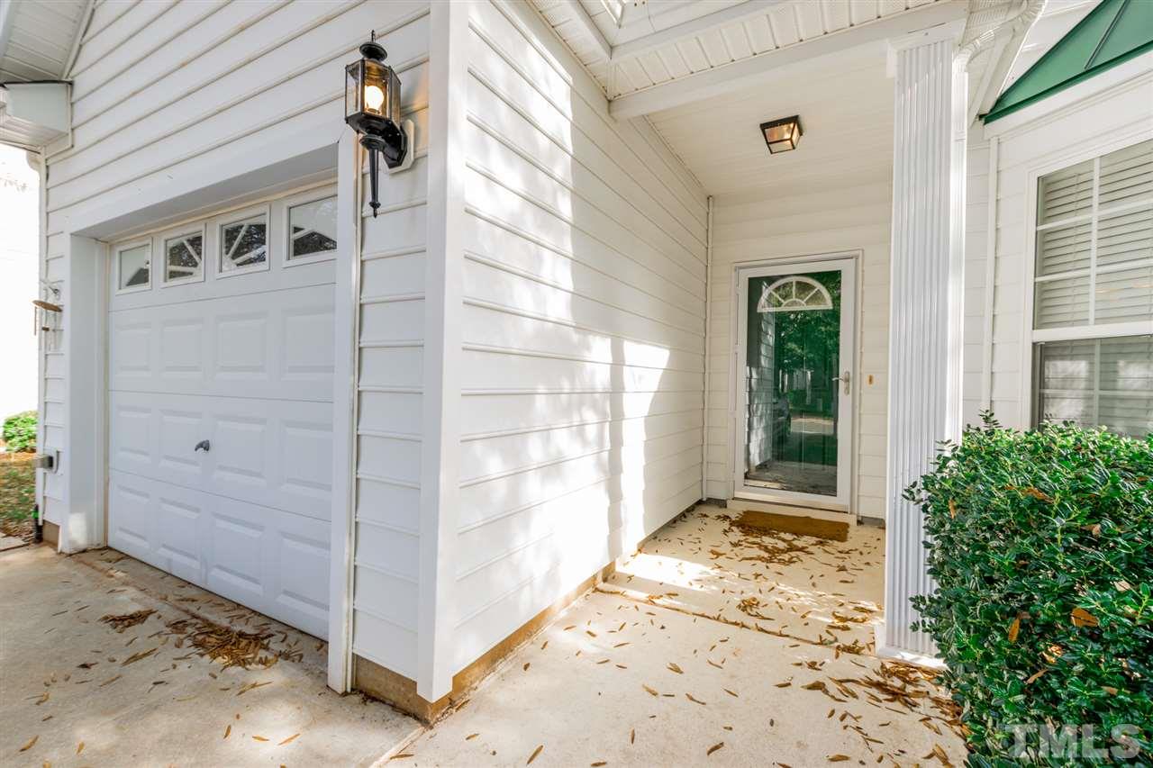 8412 Aztec Dawn Court Raleigh, NC 27613 - Photo 22 of 24 a view of a entryway door of the house