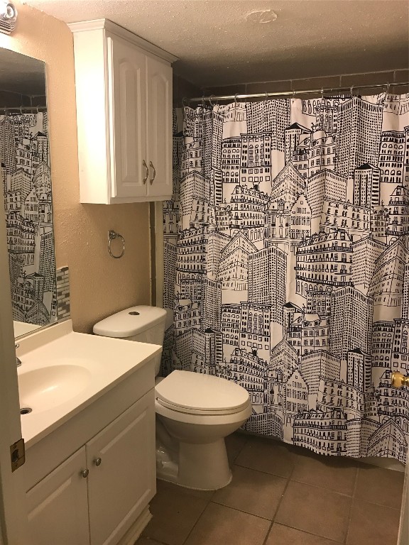 2401 Leon Street, Unit 203 Austin, TX 78705 - Photo 9 of 22 a bathroom with a toilet sink and shower