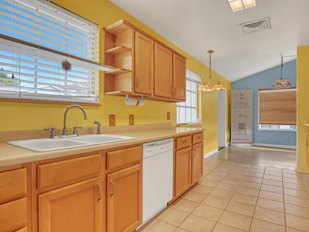 a spacious bathroom with a sink and a bathtub