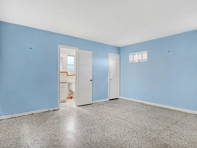 an empty room with an entryway