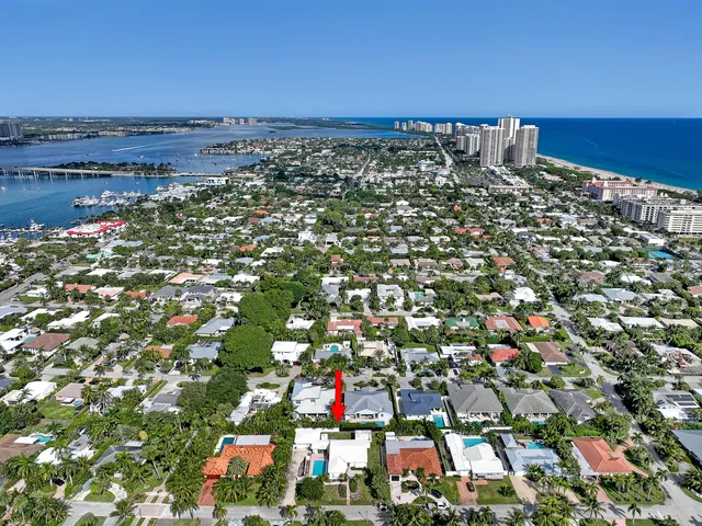 an aerial view of a house with a garden