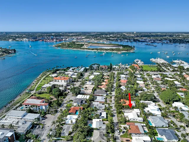 a view of a livingroom with wooden floor and a window