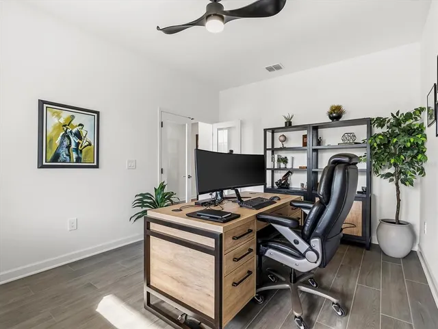 a view of a swimming pool and lounge chair