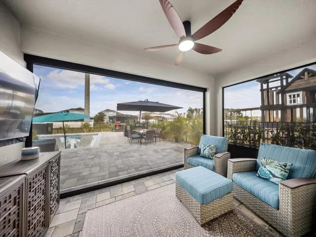 a view of a tables and chairs on the patio in the patio