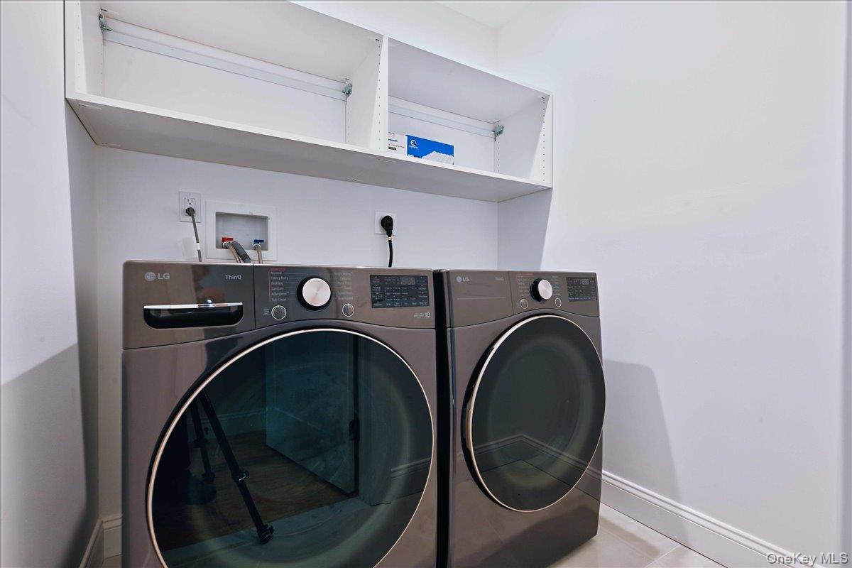 3 Bentley Road Plainview, NY 11803 - Photo 40 of 41 a utility room with dryer and washer