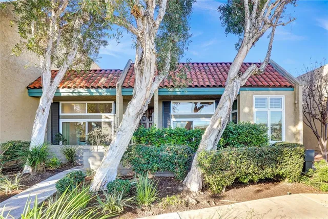 front view of a house with a small yard
