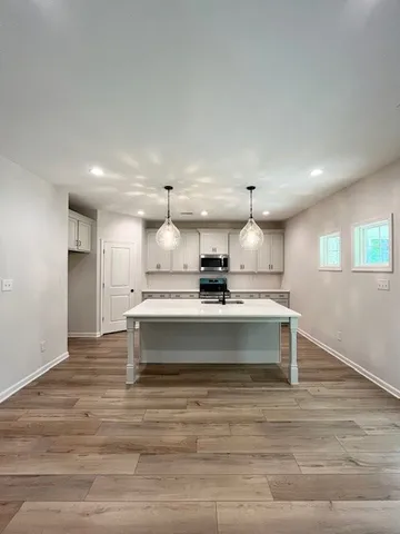 a view of kitchen and kitchen island