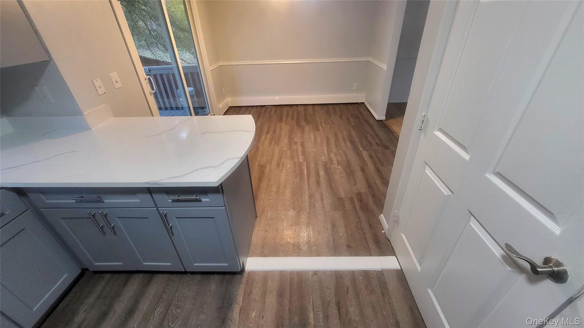 11 Pleasant Lane Poughkeepsie, NY 12603 - Photo 11 of 12 a view of wooden floor in a kitchen