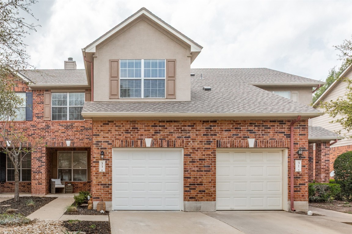 front view of a house with a street