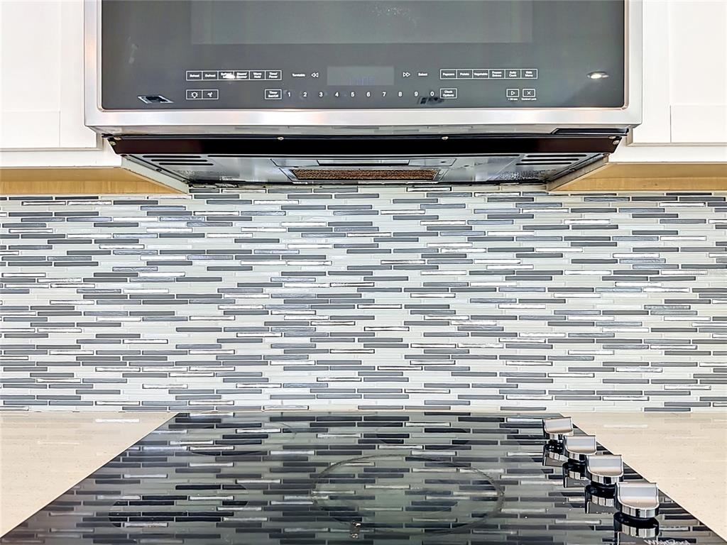 16822 Wingspread Loop Winter Garden, FL 34787 - Photo 16 of 47 a close view of a stove