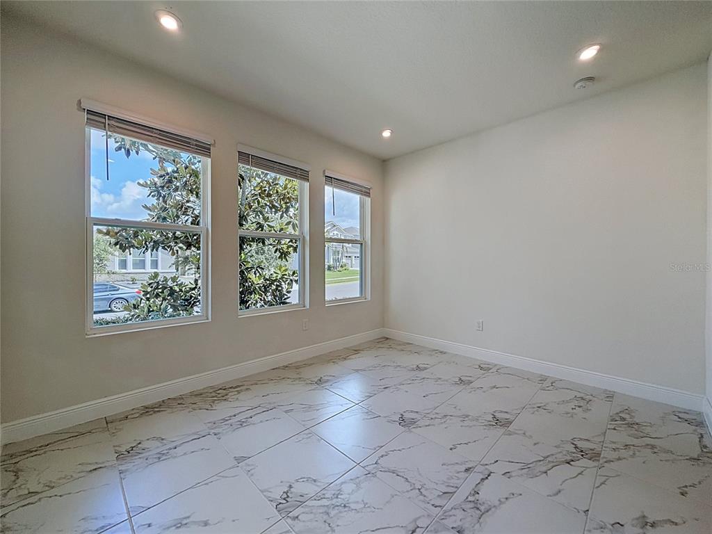 16822 Wingspread Loop Winter Garden, FL 34787 - Photo 28 of 47 a view of room with window