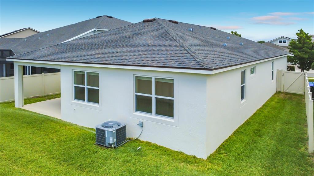 16822 Wingspread Loop Winter Garden, FL 34787 - Photo 42 of 47 a house view with a garden space